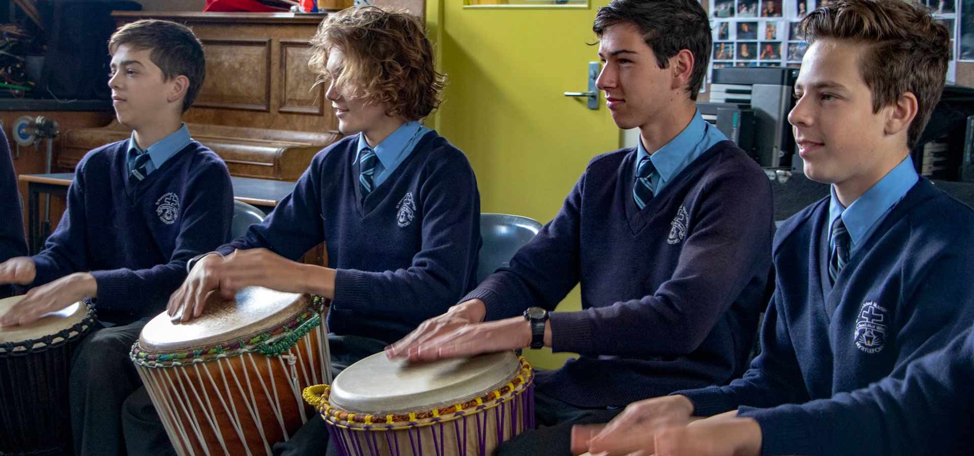 in_the_groove_education_high_school_students_drumming