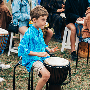 in_the_groove_drums_boy_playing_djembe